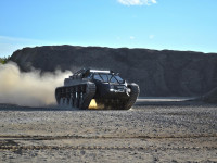 ripsaw-ev2-luxury-super-tank-driving-and-kicking-up-dust.jpg