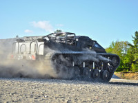 ripsaw-ev2-luxury-super-tank-driving-away1.jpg