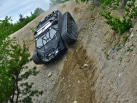 ripsaw-ev2-luxury-super-tank-driving-down-steep-slope_Snapseed.jpg